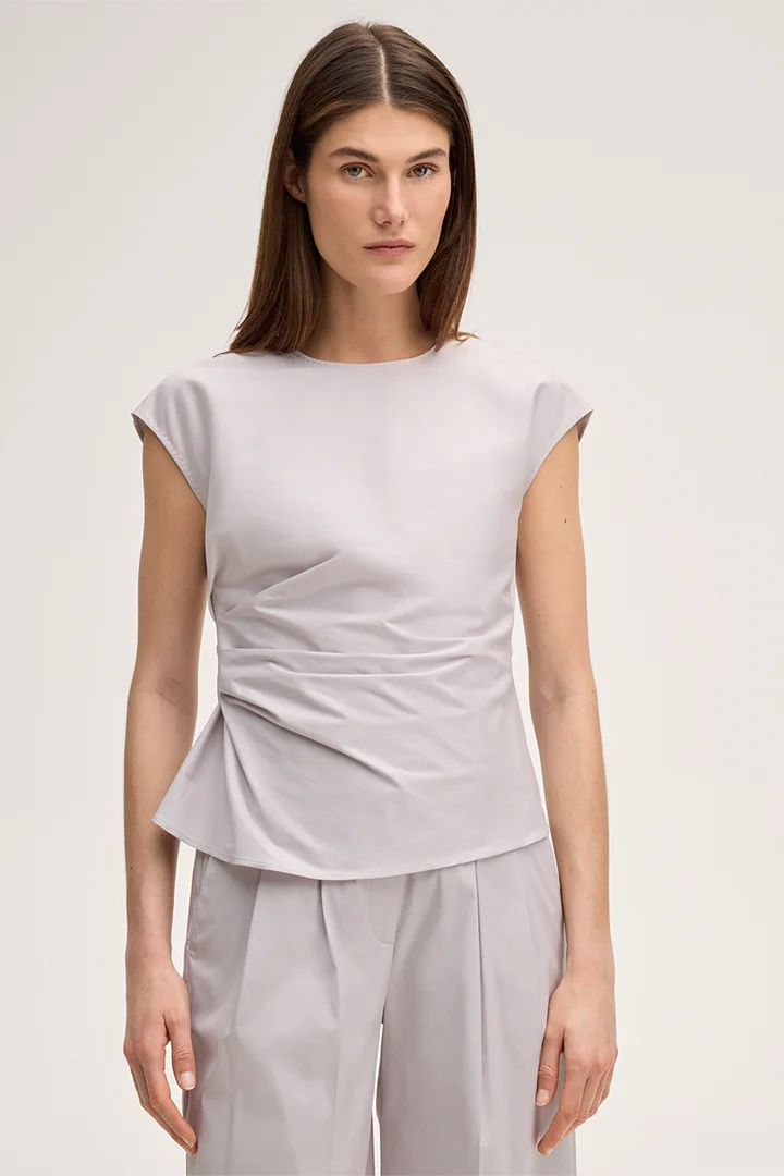 Leads to product detail page "Cotton stretch blouse top in beige"