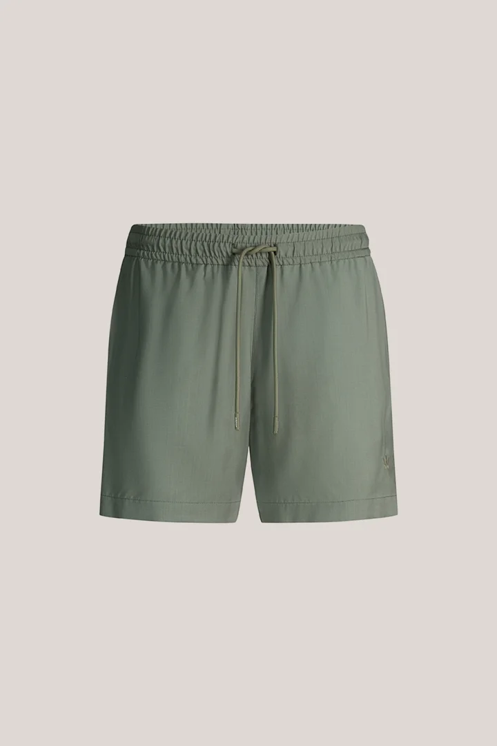 Leads to product detail page "Virgin wool swim shorts in olive green"