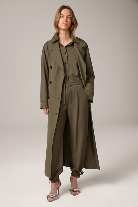 <p><strong>Shop the Look:</strong><br> Virgin wool pant suit in olive</p>