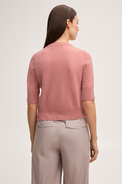 Leads to product detail page "Pink cashmere cardigan"