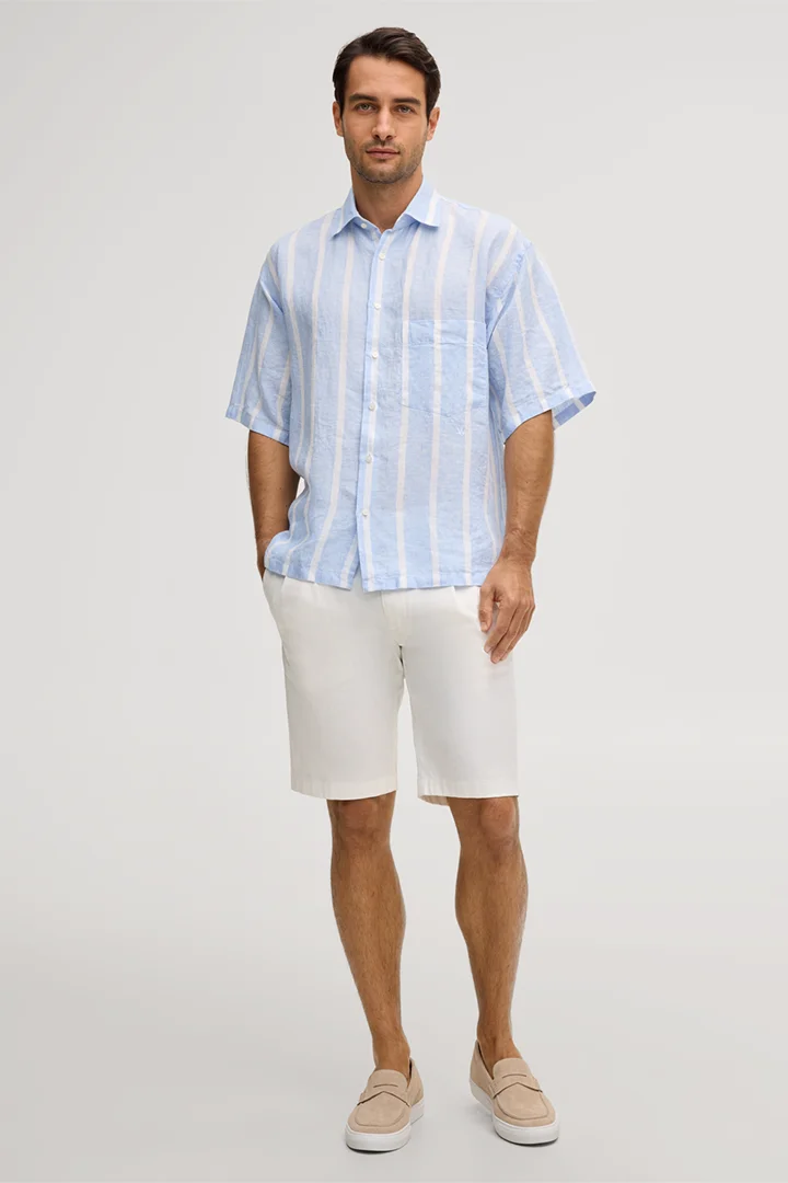 Leads to product detail page "Oberon linen shirt in blue and white stripes"