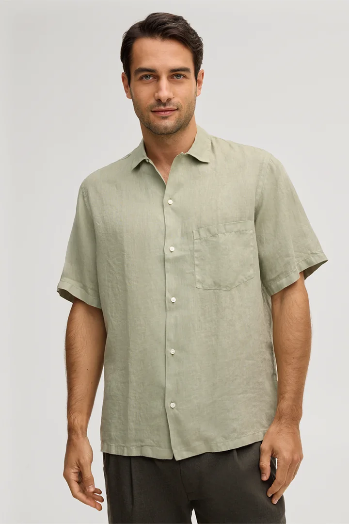 Leads to product detail page "Ovada linen shirt in light green"