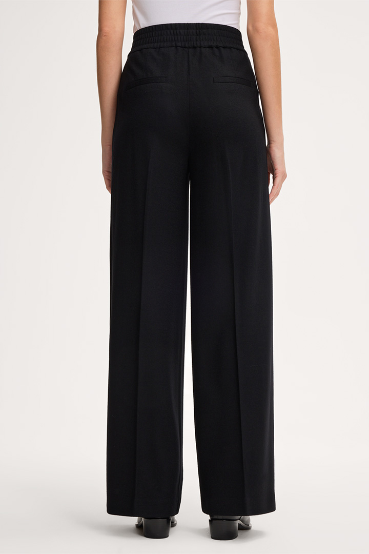Palazzo Pleat-front Trousers in Wool Jersey in Black