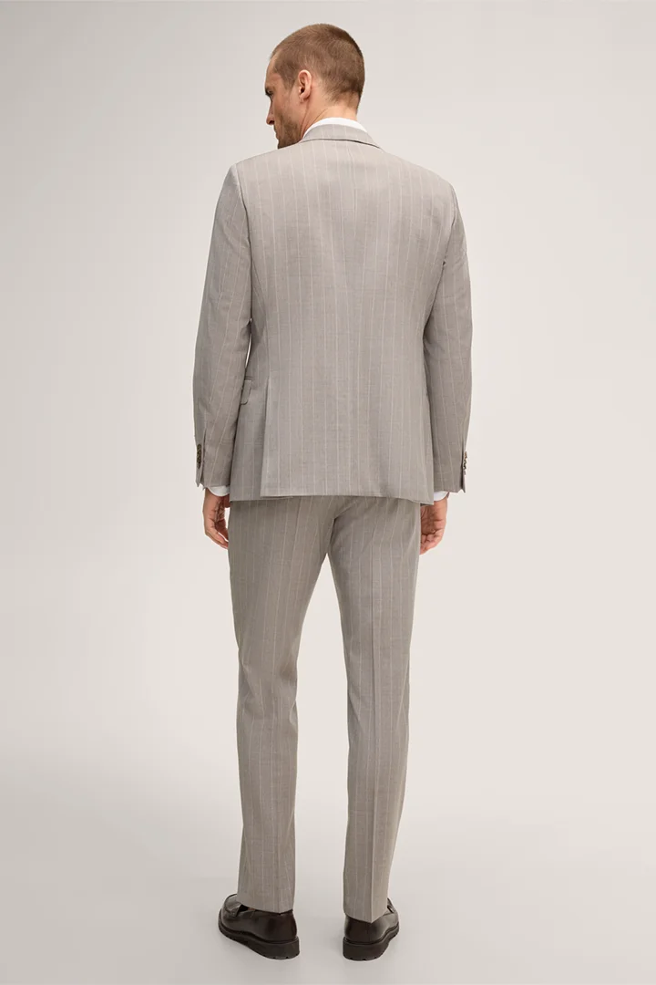 Leads to product detail page "Sera-Sole virgin wool suit in grey and brown stripes"