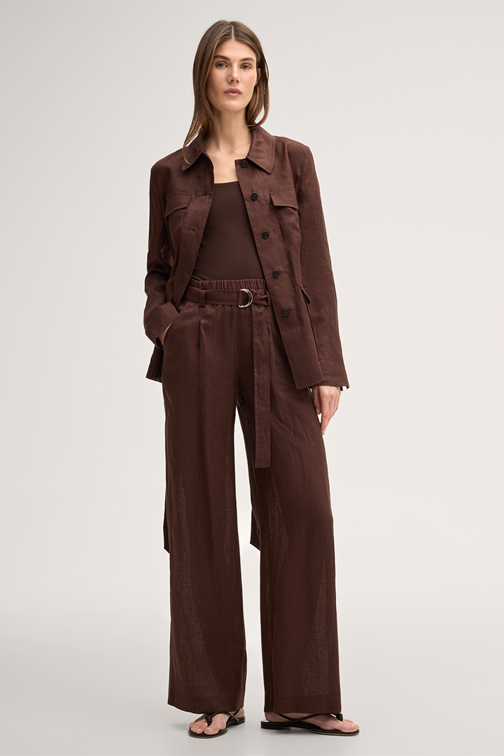 Leads to product detail page "Tencel stretch top in dark brown"