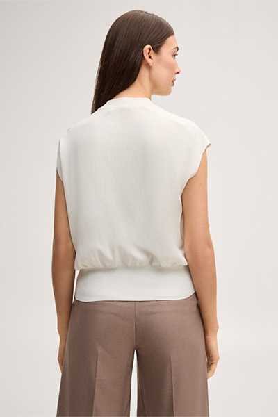 Leads to product detail page "Silk and cotton blend knitted shirt in ecru"