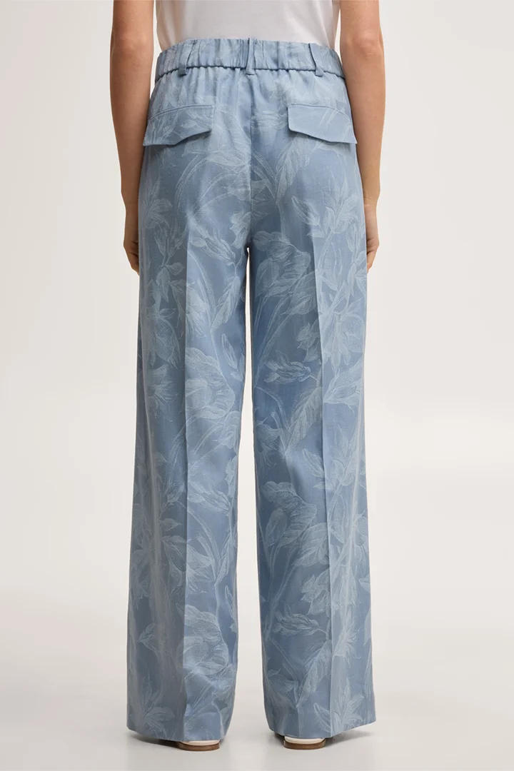 Leads to product detail page "Viscose-linen blend palazzo trousers in light blue and ecru"