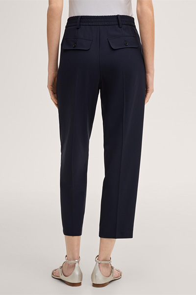 Virgin wool jogger-style pleated trousers in navy