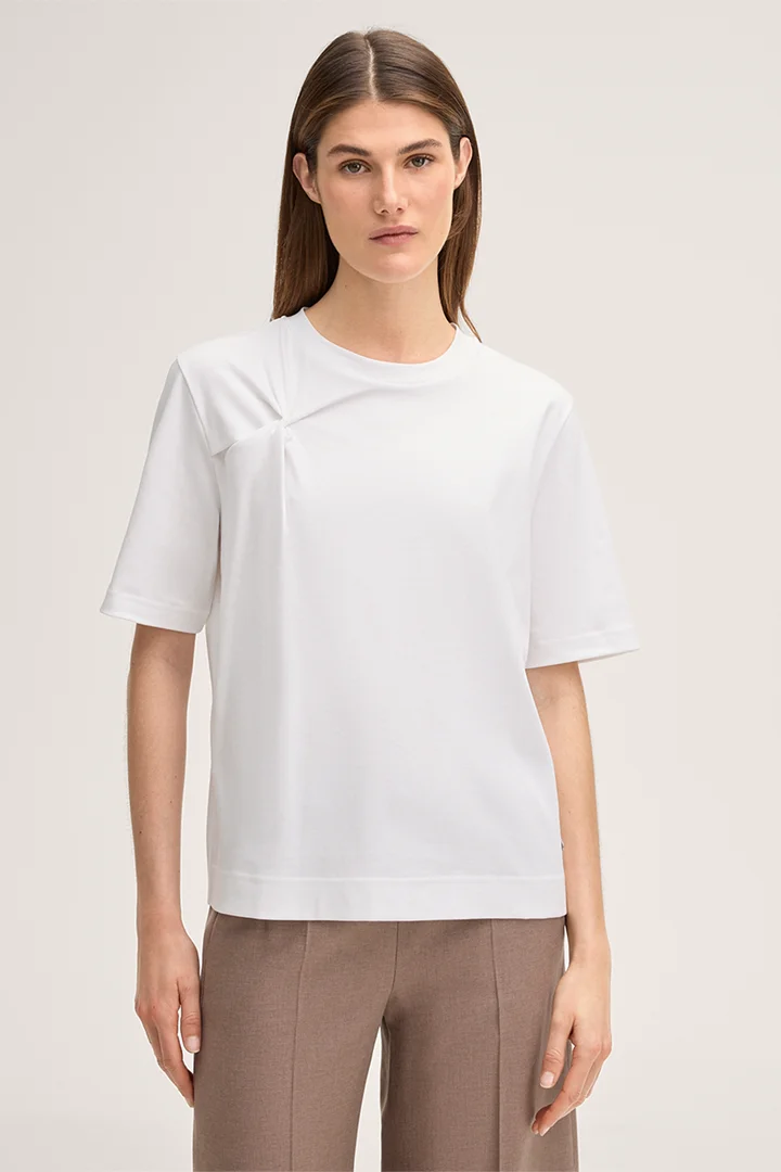 Leads to product detail page "Cotton interlock short-sleeved shirt with knot detail in white"