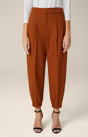 Pantalon en laine stretch de style jogging, couleur cuivre