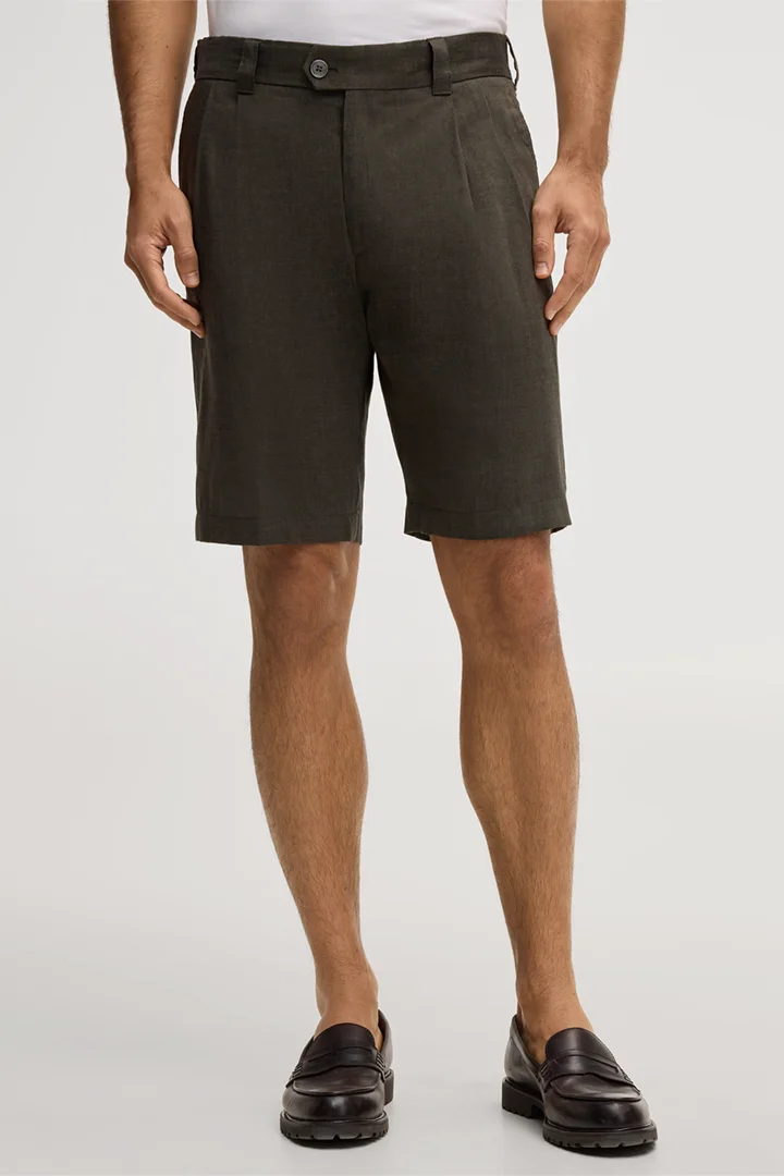 Leads to product detail page "Schio linen blend modular trousers with wool and pleat on the waistband in dark green"