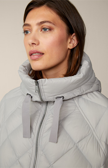Stepp-Jacke mit Kapuzenkragen in Grau